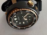 a watch that has a tag attached to it