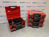 two red and black tool boxes sitting next to each other