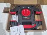 a box with a red and black object inside of it