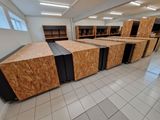 a room that has a bunch of wooden cabinets in it