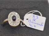 a close up of a ring with a tag attached to it