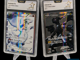 two pokemon cards in a plastic holder on a black background