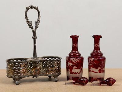 two vases sitting next to each other on a table