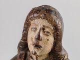 statue of a woman holding a bowl of food