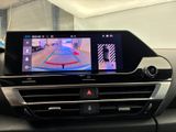 a picture of a car dashboard with a camera mounted on it