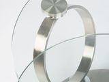 a glass table with a ring on top of it