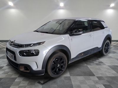 the new citrole suv is parked in a showroom