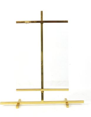 a wooden cross on a stand on a white background