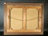 an old wooden frame with a rope hanging from it ' s sides