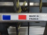 a sign that says made in france on the side of a bike