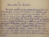 un vieux livre sur lequel est écrit un poème à la main
