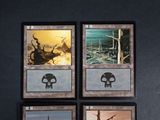 three decks of a card game with a picture of a ship in the background