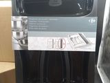 a box with a microwave and a pan on it