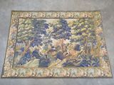 a rug with a picture of a forest scene on it