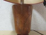 a lamp that is sitting on a table with a lamp on it