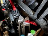 a box full of tools that are sitting on the floor