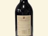 a bottle of wine that is sitting on a table