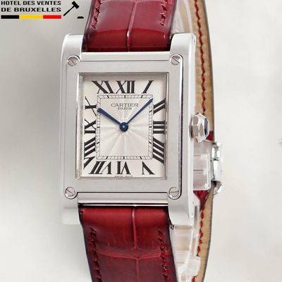 an image of a wrist watch with roman numerals on it