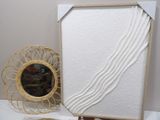 a picture of a picture frame and a mirror on a table