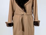 an image of a coat with a fur collar on a mannequin
