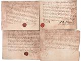 trois vieux morceaux de papier portant un cachet de cire