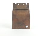 a small wooden box with a handle on a white surface