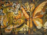 a picture of a butterfly tapestry hanging on a wall