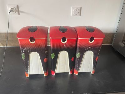 three boxes that are sitting on a counter