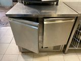 a microwave sitting on top of a counter in a kitchen
