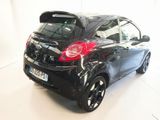a picture of a black car parked in a white room