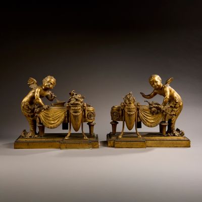 paire de figurines anciennes en bronze d'un garçon et d'une fille