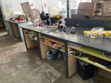 a picture of a workbench with a lot of clutter on it