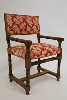 an image of a chair with a red and gold upholstered seat