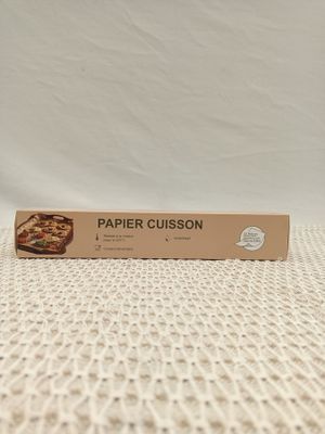 a box of paper scissors sitting on top of a table