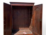 a wooden cabinet with a door open on a white background