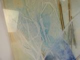 a picture of a painting on the wall of a bathroom