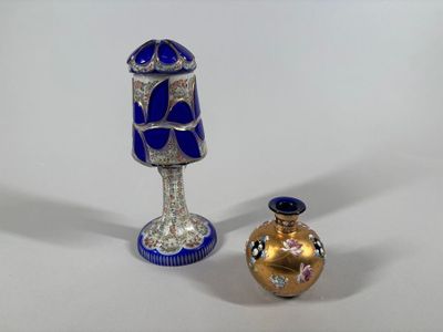 two vases sitting next to each other on a table