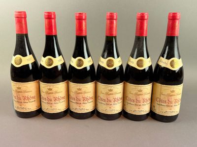 six bottles of wine lined up in a row on a table