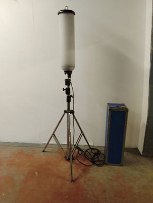an image of a room with a tripod and a camera