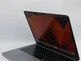 an apple macbook pro laptop computer sitting on top of a white table