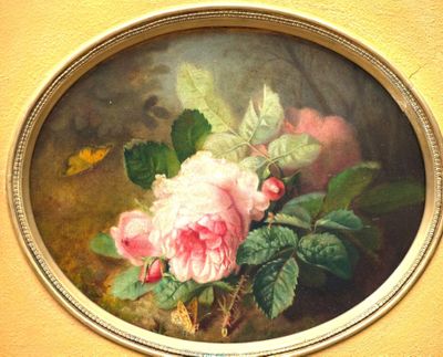 a picture of a painting of pink flowers in a gold frame