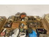 many boxes of assorted items sitting on the floor