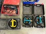 many different types of tools in a box on the floor