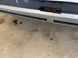 a close up of a car with a sticker on it