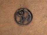 a picture of a wooden door with a metal handle