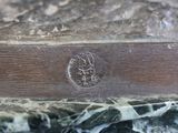 a close up of a book on a marble table