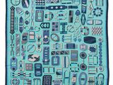 the blue and white scarf has many different items on it
