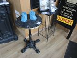 a small table with two blue napkins on top of it