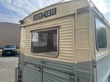an image of a trailer parked in a parking lot