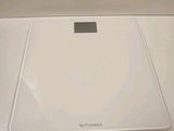 an image of a bathroom scale on a counter